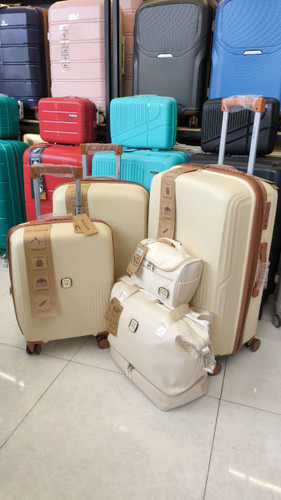 چمدان نواح رنگ شیری